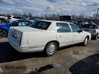 1998 Cadillac DeVille with VIN 1G6KD54Y6WU702886, listed as a Copart auction lot 42737665 with 106,454 mi miles and Salvage Title. Bid and sale history available at carsss.com. Image 3.