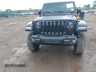 2023 Jeep Gladiator Overland with VIN 1C6JJTFM9PL593659, listed as a IAAI auction lot 42470253 with 34,374 mi miles and . Bid and sale history available at DreamBid. Image 6.