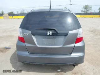 2013 Honda Fit with VIN JHMGE8H30DC056505, listed as a IAAI auction lot 42041626 with 219,454 mi miles. Bid and sale history available at carsss.com. Image 16.