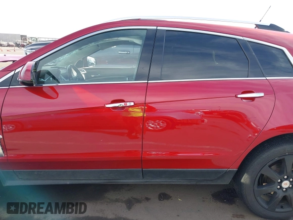 2012 Cadillac SRX Performance Collection with VIN 3GYFNBE35CS533639, listed as a IAAI auction lot 41532684 with 93,637 mi miles and . Bid and sale history available at DreamBid. Image 14.