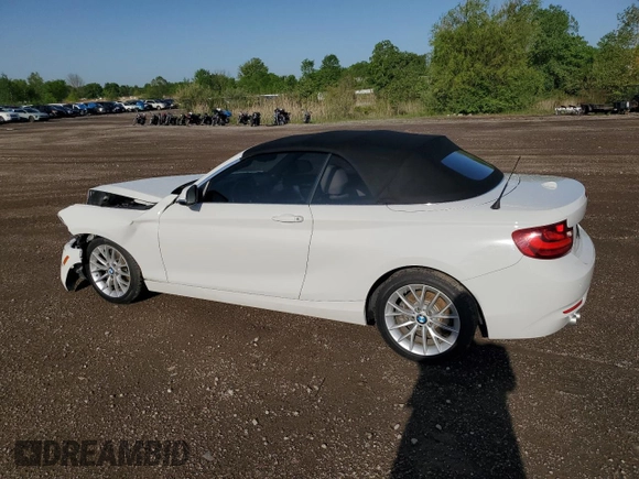 2015 BMW 2 Series 228i with VIN WBA1K5C51FV474079, listed as a Copart auction lot 57457875 with 62,946 mi miles and Salvage title. Bid and sale history available at DreamBid. Image 2.