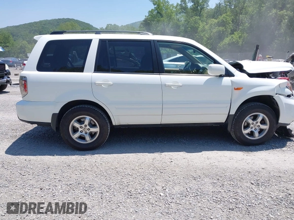 2007 Honda Pilot EX-L with VIN 5FNYF18587B000332, listed as a IAAI auction lot 42403191 with 192,771 mi miles and . Bid and sale history available at DreamBid. Image 13.
