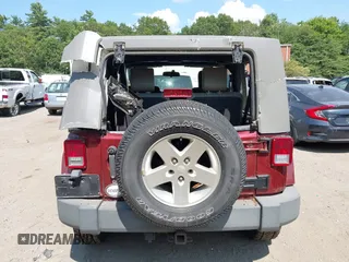 2007 Jeep Wrangler Sahara with VIN 1J8FA54157L203426, listed as a IAAI auction lot 42722278 with 168,756 mi miles and . Bid and sale history available at DreamBid. Image 16.