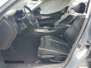 2016 Infiniti Q70 z VIN JN1BY1AP3GM220547, wystawiony jako Copart lot #54203925 z przebiegiem Nie podano mil oraz Szkody całkowita. Historia ofert i sprzedaży dostępna na DreamBid. Obrazek 7.