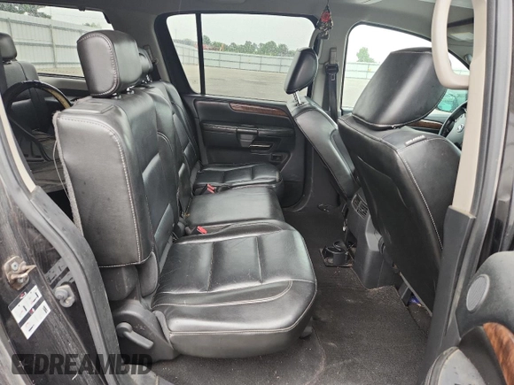 2010 Nissan Armada Titanium z VIN 5N1BA0ND0AN619506, wystawiony jako Copart lot #58329005 z przebiegiem 212 496 mil mil oraz Szkoda całkowita • Salvage title. Historia ofert i sprzedaży dostępna na DreamBid. Obrazek 11.