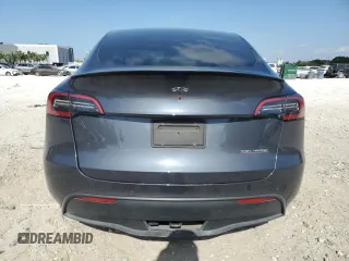 2022 Tesla Model Y Performance with VIN 7SAYGDEF9NF513648, listed as a Copart auction lot 55156475 with 29,280 mi miles and Non Repairable. Bid and sale history available at DreamBid. Image 6.