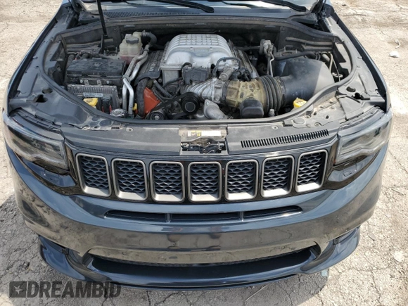 2018 Jeep Grand Cherokee Trackhawk with VIN 1C4RJFN99JC309254, listed as a Copart auction lot 64061615 with 104,558 mi miles and Clean title. Bid and sale history available at DreamBid. Image 12.