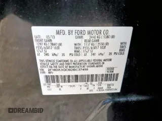 2013 Ford Edge SE with VIN 2FMDK3GC6DBC37458, listed as a Copart auction lot 60228945 with 156,410 mi miles and Salvage title. Bid and sale history available at DreamBid. Image 13.
