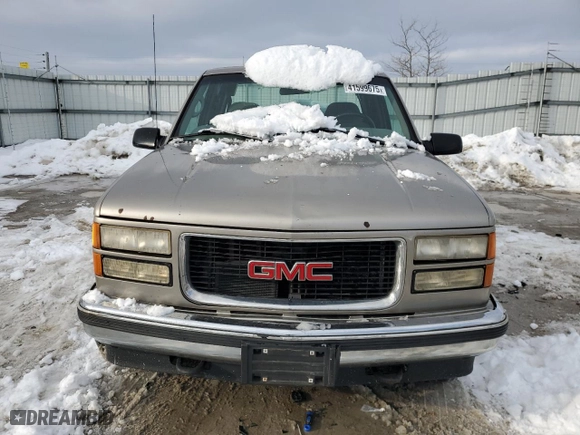 1999 GMC Sierra Classic 1500 with VIN 1GTEK19R2XR515563, listed as a Copart auction lot 41599675 with 230144 miles and Salvage Title. Bid and sale history available at carsss.com. Image 5.