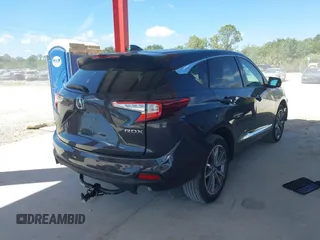 2021 Acura RDX Technology z VIN 5J8TC1H54ML016041, wystawiony jako IAAI lot #41855161 z przebiegiem 33 876 mil mil oraz . Historia ofert i sprzedaży dostępna na DreamBid. Obrazek 4.