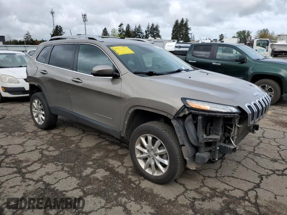 2017 Jeep Cherokee Limited with VIN 1C4PJMDSXHW633757, listed as a Copart auction lot 52146435 with 104,066 mi miles and Salvage Title. Bid and sale history available at DreamBid. Image 4.