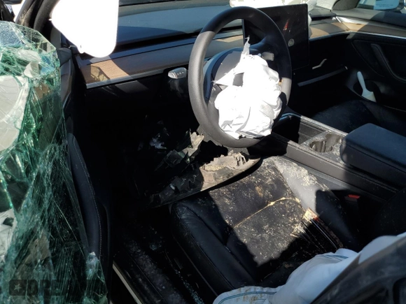 2023 Tesla Model 3 with VIN 5YJ3E1EA5PF567354, listed as a Copart auction lot 60964725 with 60,962 mi miles and Salvage title. Bid and sale history available at DreamBid. Image 8.
