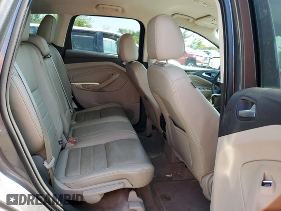 2014 Ford Escape Titanium с VIN 1FMCU0J96EUD41199, выставлен на аукционе Copart как лот 59380245 с пробегом 100 319 миль миль и Списание • Salvage title. История ставок и продаж доступна на DreamBid. Изображение 11.
