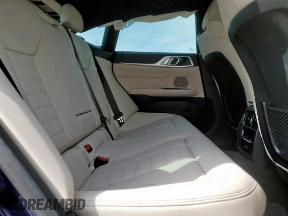 2023 BMW i4 eDrive40 z VIN WBY73AW08PFR19950, wystawiony jako Copart lot #48003365 z przebiegiem Nie podano mil oraz Szkody całkowita. Historia ofert i sprzedaży dostępna na DreamBid. Obrazek 10.