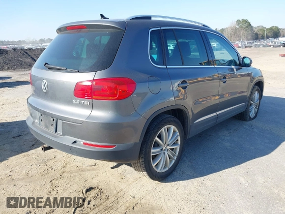 2012 Volkswagen Tiguan SE with VIN WVGAV7AX5CW000275, listed as a IAAI auction lot 41789246 with 123,618 mi miles and . Bid and sale history available at DreamBid. Image 4.