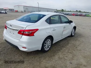 2018 Nissan Sentra S with VIN 3N1AB7AP2JY209169, listed as a IAAI auction lot 41942284 with 123,028 mi miles and . Bid and sale history available at DreamBid. Image 4.