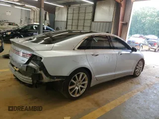 2015 Lincoln MKZ Hybrid z VIN 3LN6L2LU1FR606066, wystawiony jako Copart lot #61955415 z przebiegiem 127 214 mil mil oraz Szkoda całkowita • Salvage title. Historia ofert i sprzedaży dostępna na DreamBid. Obrazek 3.