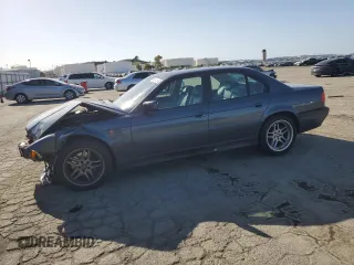 2000 BMW 7 Series 740iA with VIN WBAGG8341YDN80237, listed as a Copart auction lot 52212515 with 0 mi miles and Salvage Title. Bid and sale history available at carsss.com. Image 1.