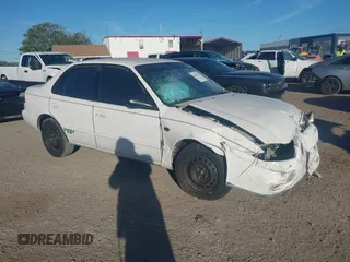 2002 Toyota Corolla CE with VIN 1NXBR12EX2Z592995, listed as a IAAI auction lot 41821313 with 207,608 mi miles and . Bid and sale history available at DreamBid. Image 1.