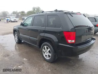 2009 Jeep Grand Cherokee Laredo with VIN 1J8GS48K39C549136, listed as a IAAI auction lot 41446925 with 162,639 mi miles. Bid and sale history available at carsss.com. Image 3.