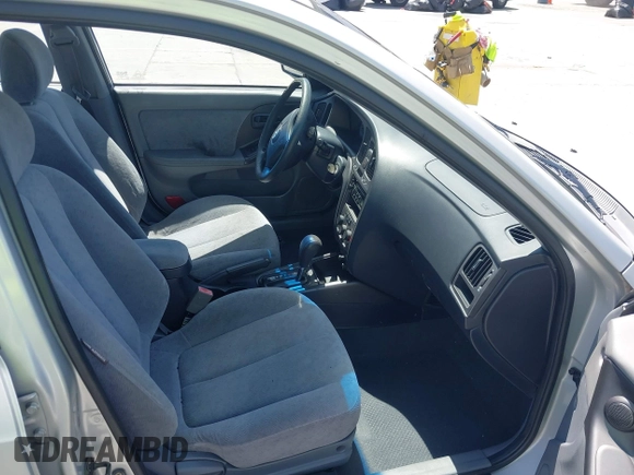 2004 Hyundai Elantra GLS z VIN KMHDN46D74U781436, wystawiony jako IAAI lot #42260519 z przebiegiem 132 943 mil mil oraz . Historia ofert i sprzedaży dostępna na DreamBid. Obrazek 5.