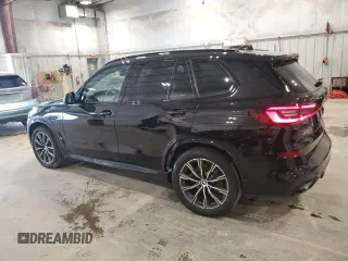 2021 BMW X5 xDrive45e with VIN 5UXTA6C02M9F45757, listed as a Copart auction lot 61991985 with 65,162 mi miles and Salvage title. Bid and sale history available at DreamBid. Image 2.