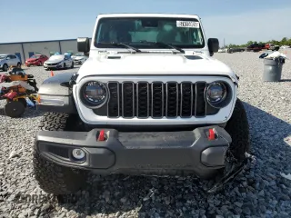 2025 Jeep Wrangler Rubicon with VIN 1C4PJXFN2SW525858, listed as a Copart auction lot 57415905 with 7,802 mi miles and Salvage title. Bid and sale history available at DreamBid. Image 5.