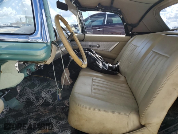 1957 Ford Thunderbird with VIN D7FH182410, listed as a Copart auction lot 77671374 with 319 mi miles and Salvage Title. Bid and sale history available at DreamBid. Image 7.