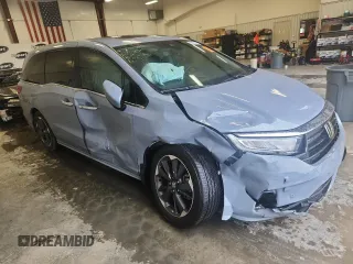 2023 Honda Odyssey Elite with VIN 5FNRL6H90PB071988, listed as a Copart auction lot 58589585 with 12,998 mi miles and Salvage title. Bid and sale history available at DreamBid. Image 4.