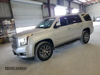 2015 GMC Yukon Denali z VIN 1GKS1CKJ1FR627148, wystawiony jako Copart lot #62028875 z przebiegiem 209 466 mil mil oraz Czysty tytuł • Clean title. Historia ofert i sprzedaży dostępna na DreamBid. Obrazek 1.