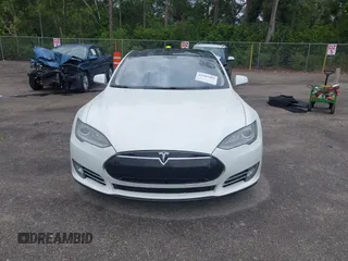 2013 Tesla Model S Performance with VIN 5YJSA1DP9DFP04076, listed as a IAAI auction lot 42185465 with 179,640 mi miles and . Bid and sale history available at DreamBid. Image 6.