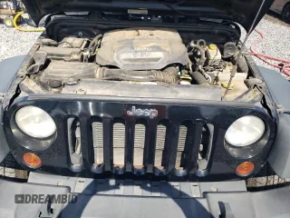 2013 Jeep Wrangler Sport with VIN 1C4AJWAG5DL694110, listed as a Copart auction lot 52200885 with 187,924 mi miles and Salvage Title. Bid and sale history available at carsss.com. Image 11.