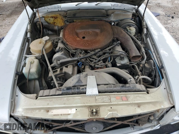 1977 Mercedes-Benz SLC с VIN 10702412017236, выставлен на аукционе Copart как лот 62397525 с пробегом 231 870 миль миль и Чистый • Clean title. История ставок и продаж доступна на DreamBid. Изображение 11.