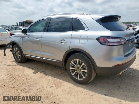 2021 Lincoln Nautilus Standard with VIN 2LMPJ6J97MBL10890, listed as a Copart auction lot 57860015 with 7,052 mi miles and Salvage title. Bid and sale history available at DreamBid. Image 2.