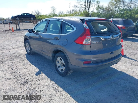 2015 Honda CR-V LX with VIN 2HKRM3H31FH557779, listed as a IAAI auction lot 42098299 with 211,683 mi miles and . Bid and sale history available at carsss.com. Image 3.