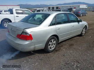 2003 Toyota Avalon XL with VIN 4T1BF28B43U305633, listed as a IAAI auction lot 42033322 with 246,802 mi miles. Bid and sale history available at carsss.com. Image 4.