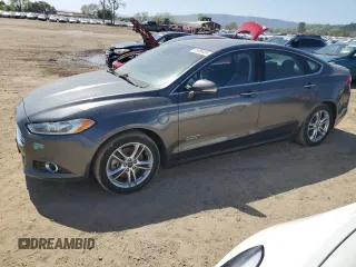 2015 Ford Fusion Energi Titanium with VIN 3FA6P0SU0FR137122, listed as a Copart auction lot 51986455 with 138,179 mi miles and Clean Title. Bid and sale history available at carsss.com. Image 1.