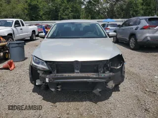 2011 Volkswagen Jetta SE z VIN 3VWDX7AJ0BM319621, wystawiony jako Copart lot #58808615 z przebiegiem 65 829 mil mil oraz Szkoda całkowita • Salvage title. Historia ofert i sprzedaży dostępna na DreamBid. Obrazek 5.