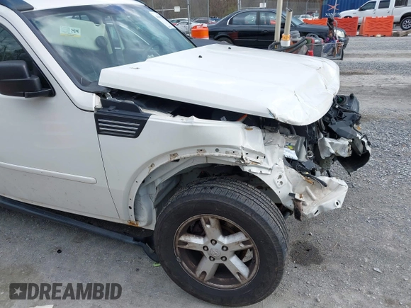 2007 Dodge Nitro SXT with VIN 1D8GU28K77W727391, listed as a IAAI auction lot 41869288 with 214,920 mi miles. Bid and sale history available at carsss.com. Image 17.