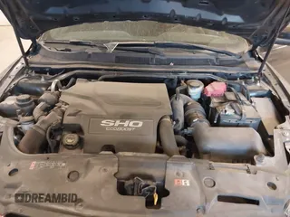 2015 Ford Taurus SHO with VIN 1FAHP2KT2FG148691, listed as a IAAI auction lot 42033867 with 94,840 mi miles and . Bid and sale history available at DreamBid. Image 10.
