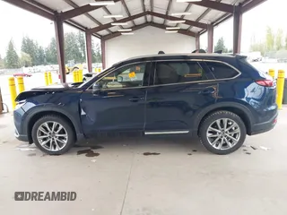 2018 Mazda CX-9 Grand Touring with VIN JM3TCBDY0J0216195, listed as a IAAI auction lot 41976122 with 90,083 mi miles and . Bid and sale history available at carsss.com. Image 14.