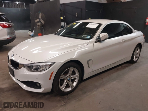 2015 BMW 4 Series 428i xDrive with VIN WBA3T1C52FP821020, listed as a IAAI auction lot 42004707 with 74,951 mi miles and . Bid and sale history available at carsss.com. Image 2.