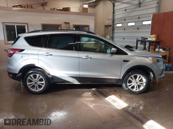2018 Ford Escape SE with VIN 1FMCU0G94JUB62791, listed as a IAAI auction lot 41410702 with 115,180 mi miles. Bid and sale history available at carsss.com. Image 14.