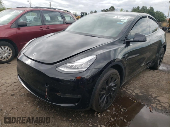 2022 Tesla Model Y Long Range z VIN 7SAYGDEEXNA008898, wystawiony jako Copart lot #54915445 z przebiegiem 35 467 mil mil oraz Szkoda całkowita • Salvage title. Historia ofert i sprzedaży dostępna na DreamBid. Obrazek 1.