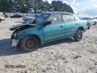 1997 Mazda Protege DX with VIN JM1BC1415V0118853, listed as a Copart auction lot 71678334 with Not Provided miles and Salvage Title. Bid and sale history available at DreamBid. Image 1.