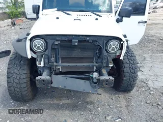 2012 Jeep Wrangler Unlimited Sport z VIN 1C4HJWDG0CL222194, wystawiony jako IAAI lot #42076024 z przebiegiem Nie podano mil oraz . Historia ofert i sprzedaży dostępna na DreamBid. Obrazek 6.