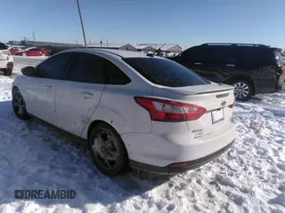 2013 Ford Focus SE z VIN 1FADP3F23DL337201, wystawiony jako IAAI lot #41630163 z przebiegiem 163 979 mil mil oraz . Historia ofert i sprzedaży dostępna na DreamBid. Obrazek 3.