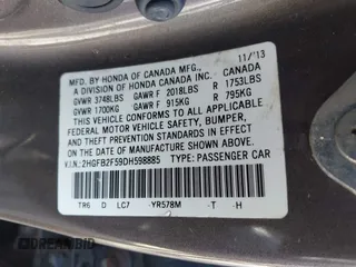 2013 Honda Civic LX with VIN 2HGFB2F59DH598885, listed as a IAAI auction lot 41734451 with 124,453 mi miles and . Bid and sale history available at DreamBid. Image 9.