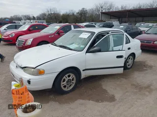 1999 Chevrolet Prizm z VIN 1Y1SK5487XZ439374, wystawiony jako IAAI lot #41746472 z przebiegiem 152 674 mil mil oraz . Historia ofert i sprzedaży dostępna na DreamBid. Obrazek 2.