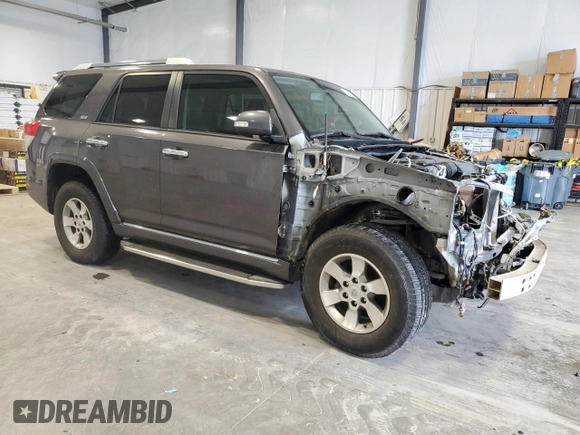 2013 Toyota 4Runner SR5 with VIN JTEZU5JR2D5054927, listed as a Copart auction lot 60018695 with 178,684 mi miles and Clean title. Bid and sale history available at DreamBid. Image 4.